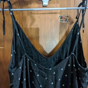 Spaghetti strap black and white jumpsuit with pockets